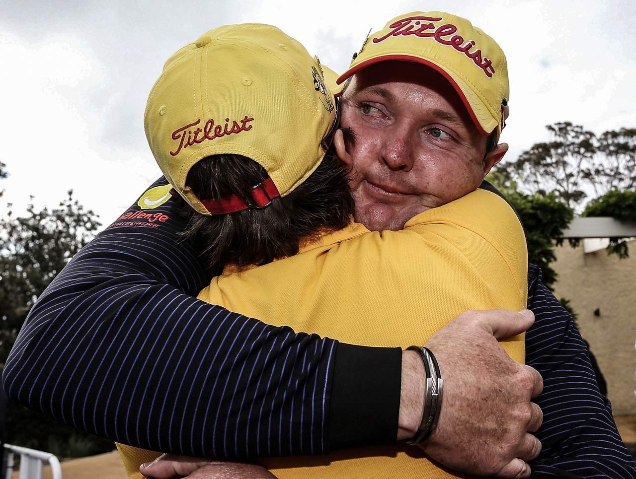 jarrod lyle yellow titleist hat